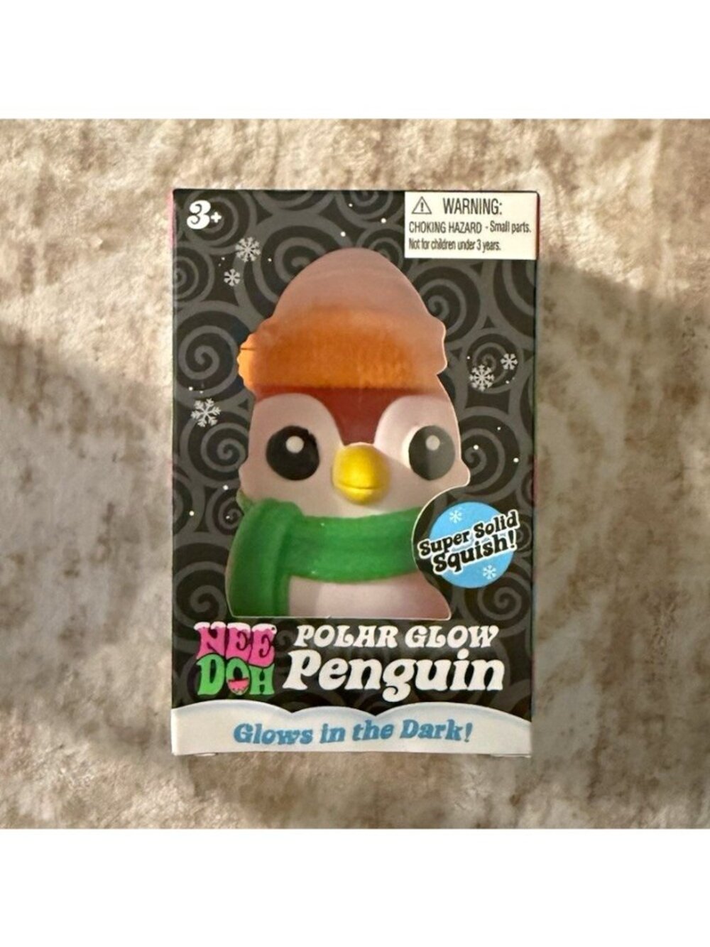 Schylling NeeDoh Polar Glow Penguin Glow-in-the-Dark Squeeze Toy